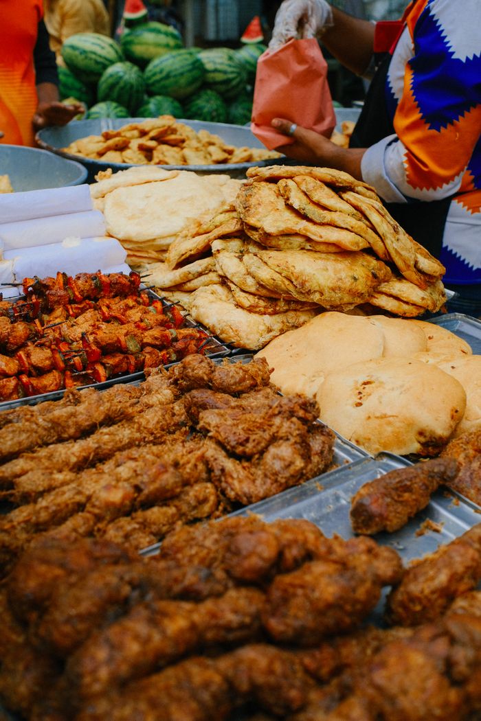 services-img-03 Explore the vibrant street food scene in Dhaka, Bangladesh, featuring delicious iftar dishes during Ramadan.